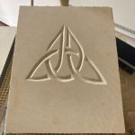 Celtic knot carved in relief on stone block