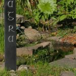 large garden pillar carved in Welsh slate