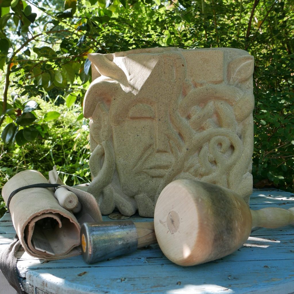 modernist dryad carved in stone